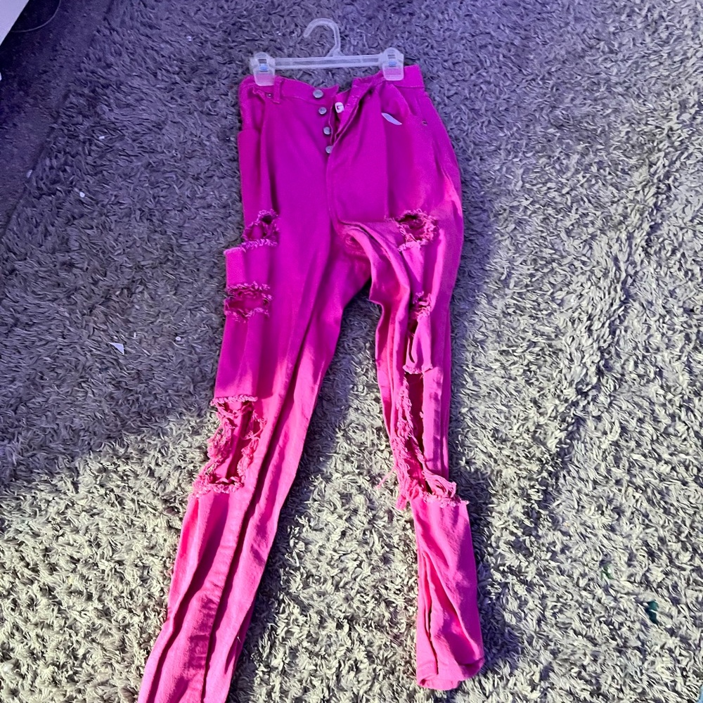 Pink ripped jeans